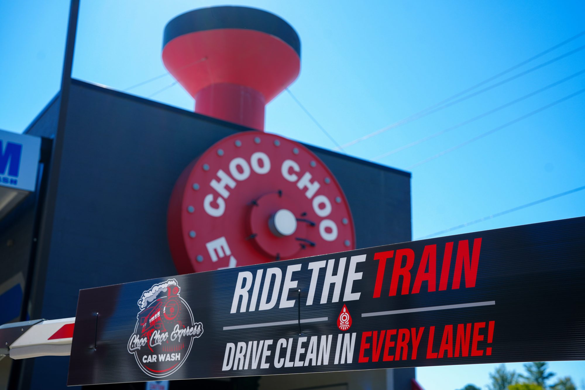 Choo Choo Express Car Wash, Ride the Train signage